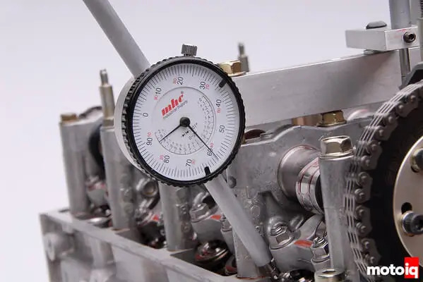 dial indicator’s needle remains parallel to the valve